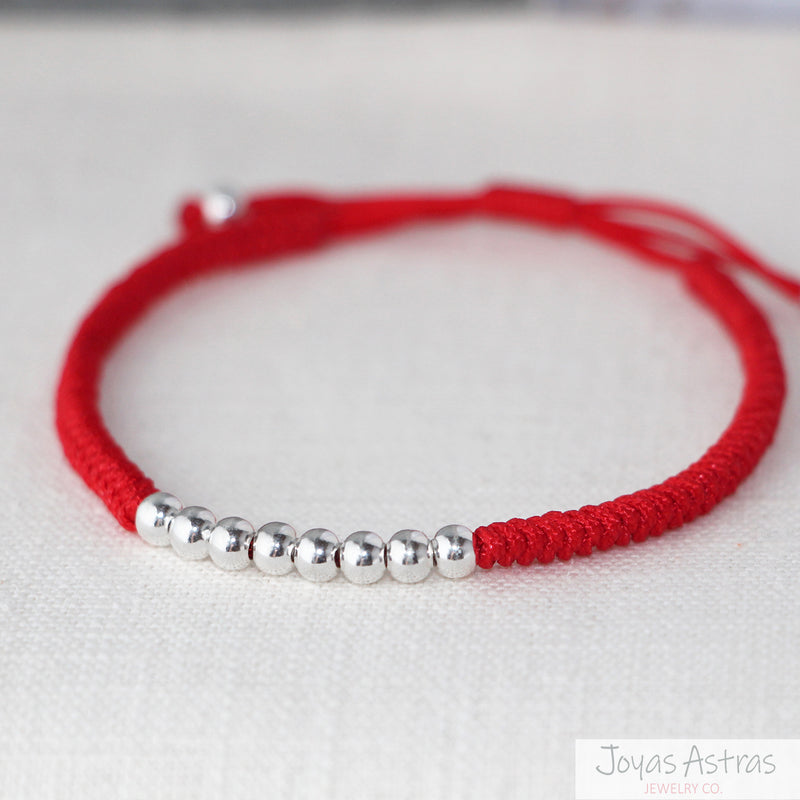 Pulsera de Hilo Rojo con 8 Esferas Ajustable