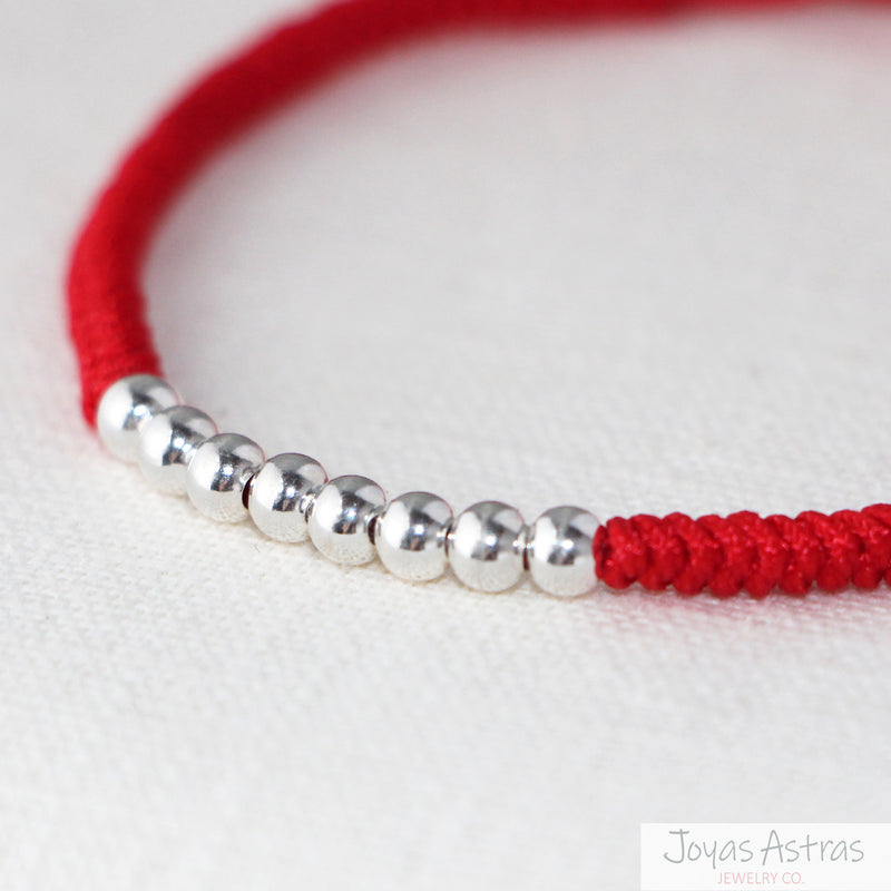 Pulsera de Hilo Rojo con 8 Esferas Ajustable