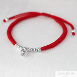 Pulsera de Hilo Rojo con 8 Esferas con Cascabel Ajustable