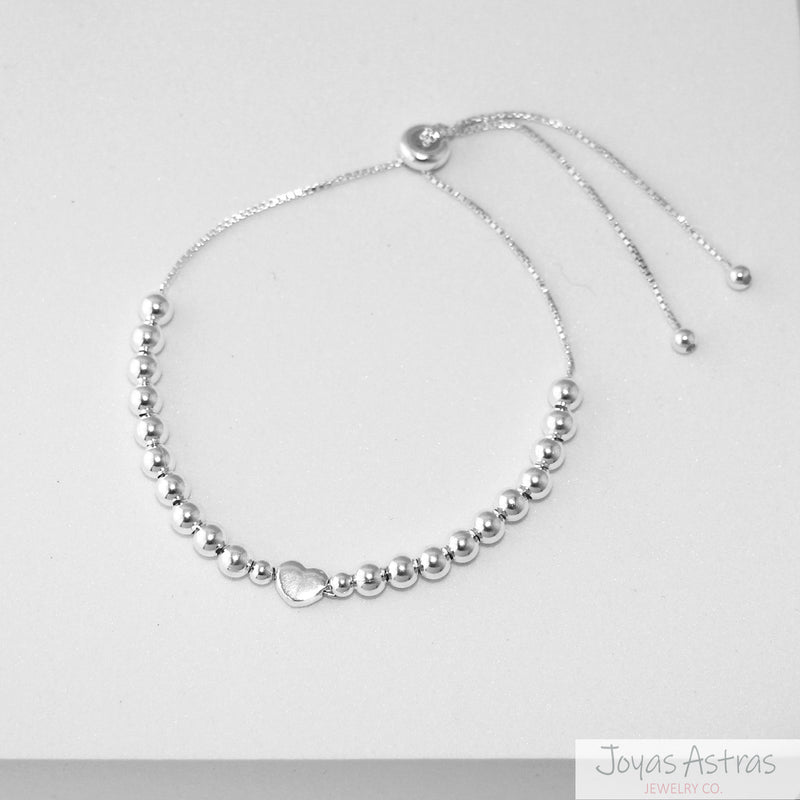 PULSERA CON ESFERAS HEART AJUSTABLE