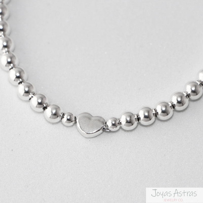 PULSERA CON ESFERAS HEART AJUSTABLE