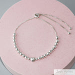 PULSERA CON ESFERAS HEART AJUSTABLE