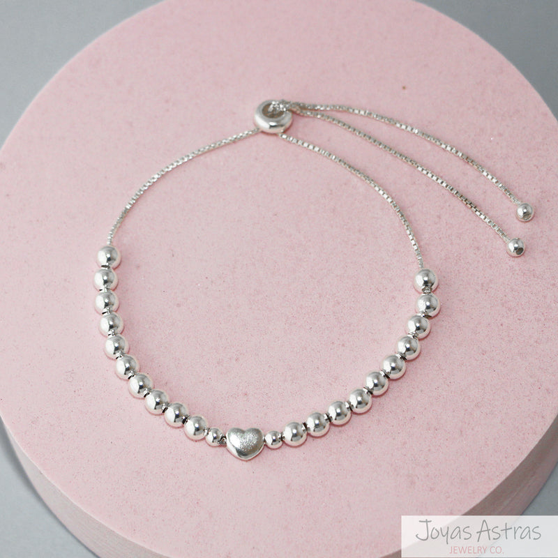 PULSERA CON ESFERAS HEART AJUSTABLE