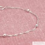 PULSERA SINGAPUR CON 5 ESFERAS